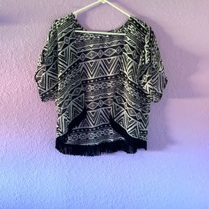 A stylish light jacket with dangling fabric at the ends